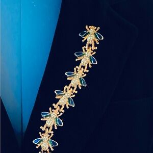 Seven bee, double pin rhinestone and enamel brooch.